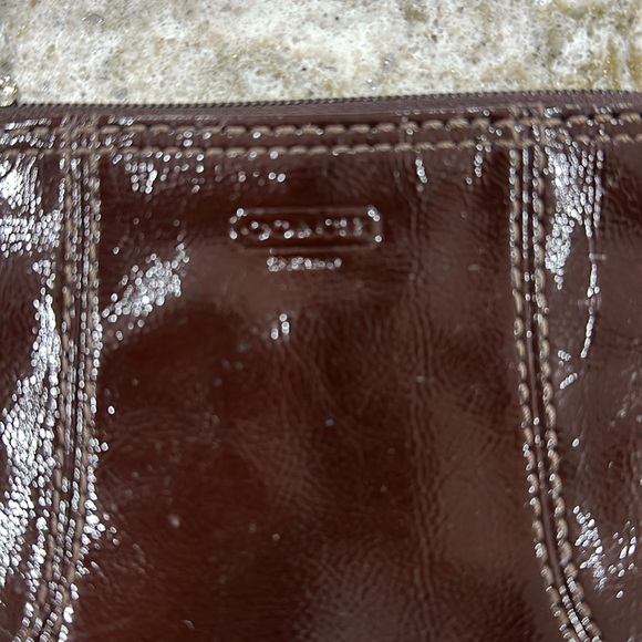 COACH WRISTLET in brown  with silver tone hardware and COACH LOGO TAG - Picture 2 of 5